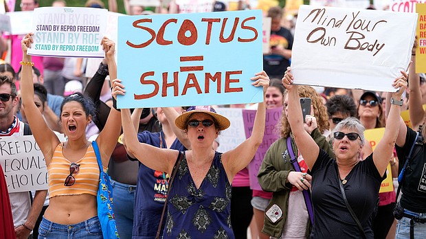 Abortion-rights activist rally at the Indiana Statehouse following Supreme Court's decision to overturn Roe v. Wade, Saturday, June 25, in Indianapolis.
Mandatory Credit:	AJ Mast/AP