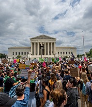 People protest in response to the Dobbs v Jackson Women's Health Organization ruling in front of the U.S. Supreme Court on June 24.
Mandatory Credit:	Brandon Bell/Getty Images