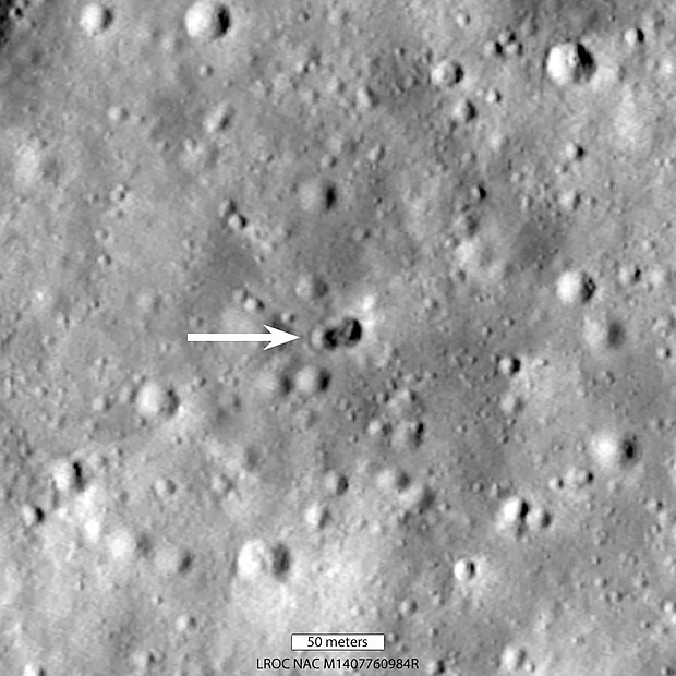 A rocket body hit the moon on March 4, creating a double crater, as indicated by the white arrow.
Mandatory Credit: NASA/Goddard/Arizona State University