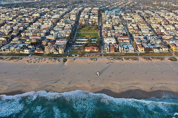 A plan to return a stretch of Southern California beachfront real estate, pictured here, on April 19, 2021, to the descendants of its Black owners, nearly a century after it was taken by the city of Manhattan Beach, is scheduled for a vote by the Los Angeles County Board of Supervisors.
Mandatory Credit:	Mario Tama/Getty Images