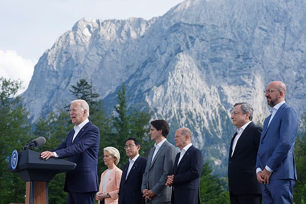 President Joe Biden departed the first of his two summits in Europe, committing with other top world leaders to back Ukraine in its war against Russia "for as long as it takes."
Mandatory Credit:	Lukas Barth/AP