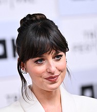 Dakota Johnson, here on June 13, is opening up about her experience in "Fifty Shades of Grey."
Mandatory Credit:	Roy Rochlin/Getty Images