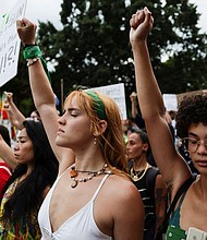Multiple polls conducted since the Supreme Court's ruling overturning Roe v. Wade find that broad majorities of the public disapprove and pictured, activists in Washington, on June 26.
Mandatory Credit:	Evelyn Hockstein/Reuters