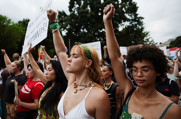 Multiple polls conducted since the Supreme Court's ruling overturning Roe v. Wade find that broad majorities of the public disapprove and pictured, activists in Washington, on June 26.
Mandatory Credit:	Evelyn Hockstein/Reuters
