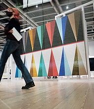 People walk through the Whitney Biennial show at the Whitney Museum of Art on April 6, in New York City.
Mandatory Credit:	Spencer Platt/Getty Images