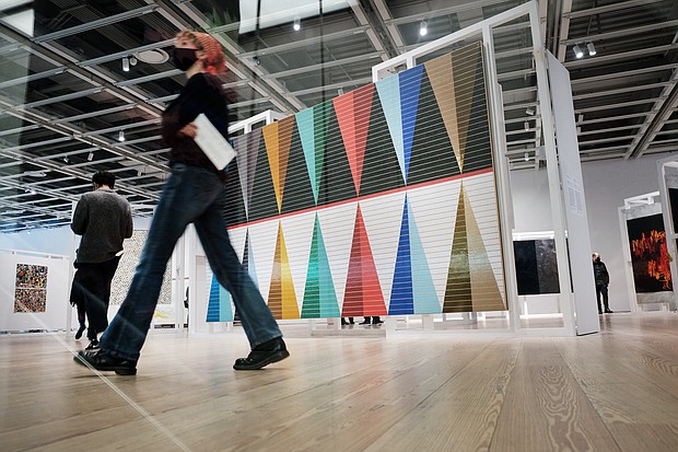 People walk through the Whitney Biennial show at the Whitney Museum of Art on April 6, in New York City.
Mandatory Credit:	Spencer Platt/Getty Images