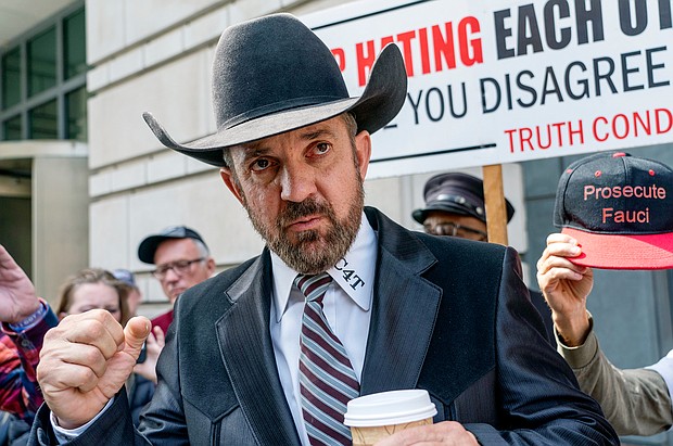 Otero County Commissioner Couy Griffin stands outside the federal court on March 22, in Washington. A federal judge rejected an attempt by a New Mexico county commissioner to shut down state proceedings against him that seek to remove him from office because of his conviction for trespassing on US Capitol grounds on January 6, 2021.
Mandatory Credit:	Gemunu Amarasinghe/AP/FILE