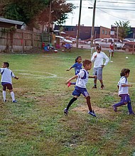 A game of soccer is always on the menu as these energetic children demonstrated on June 25 during the 15th Latino Festival at Sacred Heart Church on Perry Street in Richmond’s South Side.