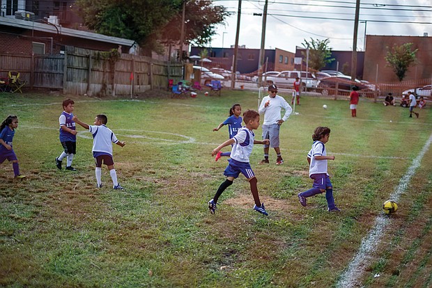 A game of soccer is always on the menu as these energetic children demonstrated on June 25 during the 15th Latino Festival at Sacred Heart Church on Perry Street in Richmond’s South Side.