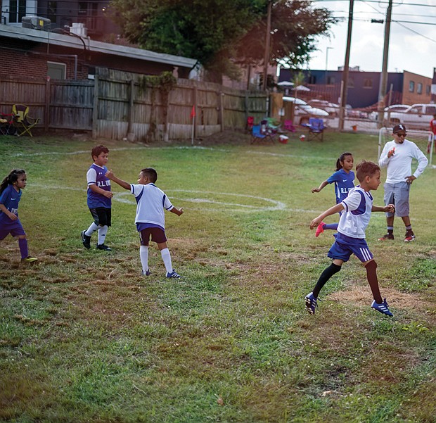 A game of soccer is always on the menu as these energetic children demonstrated on June 25 during the 15th Latino Festival at Sacred Heart Church on Perry Street in Richmond’s South Side.