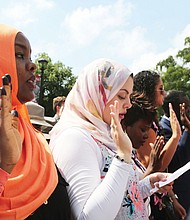 More than 50 people will be sworn in as American citizens during a naturalization ceremony on July 4 at the Virginia Museum of History and Culture. Chief Judge Roger L. Gregory of the Richmond-based U.S. 4th Circuit Court of Appeals will administer the oath to the new citizens. This photo is from a past ceremony.