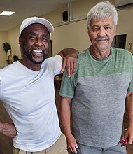 William “Junie” Bullock, left, was a Richmond firefighter for 18 years, during which time he heroically rescued several residents from the ninth floor of the Boxwood Building at Imperial Plaza on Bellevue Avenue. The 79-year-old Richmond native has never been recognized for his heroics on June 11, 1978. He shares memories of that day with retired firefighter Jack R. McIntyre, 72, who was driving the Company 46 ladder truck that enabled Mr. Bullock to gain entry to the top floor of the building.