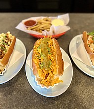 Rodeo Dog, Curryous Frank, Guac-A-Dog and Fries with House Made Ketchup and Roasted Garlic Aioli