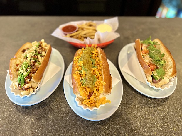 Rodeo Dog, Curryous Frank, Guac-A-Dog and Fries with House Made Ketchup and Roasted Garlic Aioli