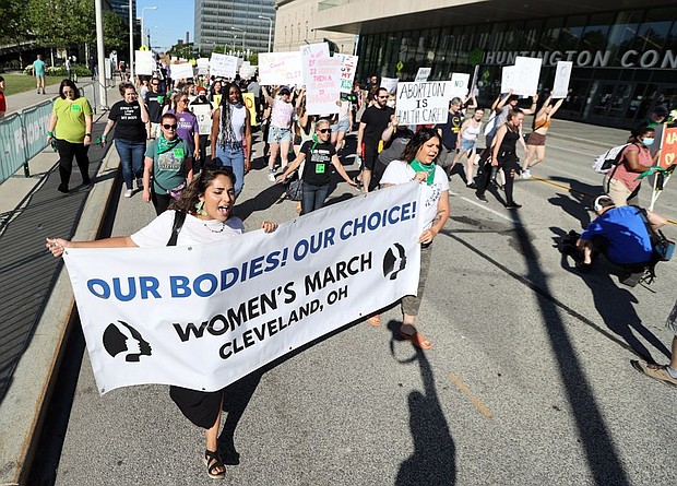 Protestors take to the streets, marching in protest to the Supreme Court's decision to overturn Roe vs. Wade, stripping the federal government of abortion rights and giving it back to the states.