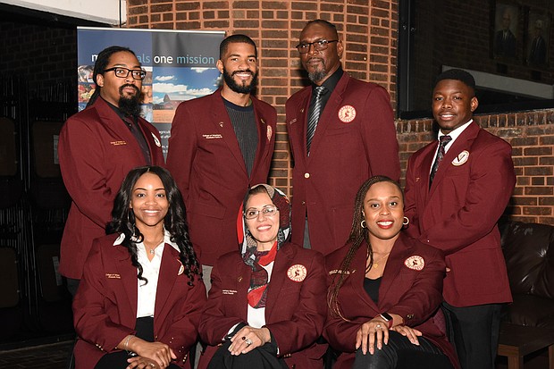 The DGPH program’s assistant director of Analytics and Career Placement with MPH graduate students.