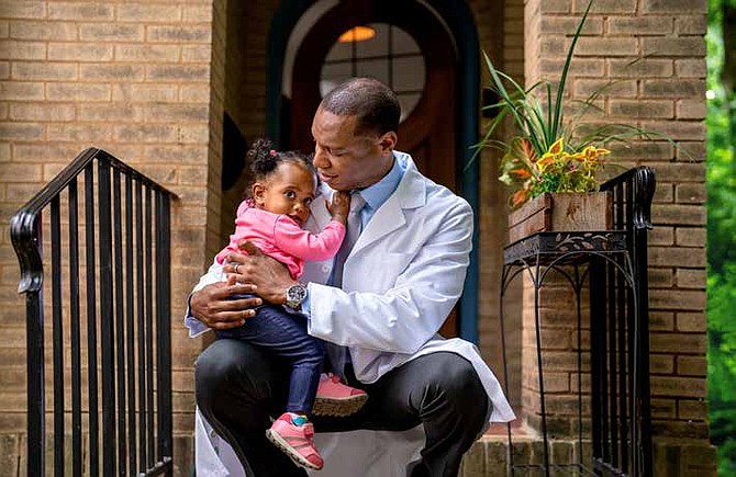Dr. David Trotter, with his daughter. Trotter says the Moderna and Pfizer vaccines have been proven safe to give to children. PHOTO PROVIDED BY FLOWERS COMMUNICATIONS GROUP.