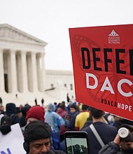 Immigration rights activists take part in a rally in front of the US Supreme Court in Washington, DC in November 2019.
Mandatory Credit:	MANDEL NGAN/AFP/Getty Images