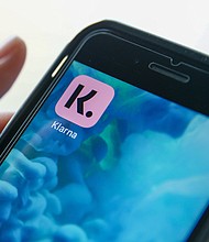 Buy Now, Pay Later installment plans have become popular among consumers seeking to spread out the cost of big-ticket purchases.
Mandatory Credit:	Hollie Adams/Bloomberg/Getty Images