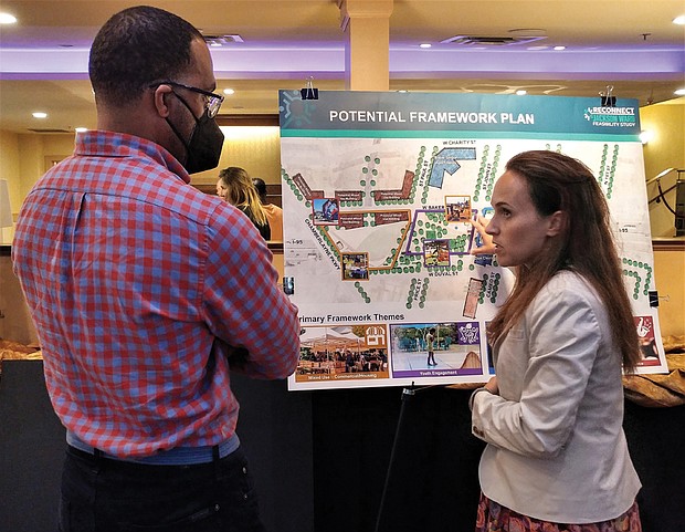 Maritza M. Pechin, deputy director for Richmond’s Office of Equitable Development, and C.B. Chambliss discuss the latest framework for the Reconnect Jackson Ward Project last Wednesday at the Hippodrome Theater.