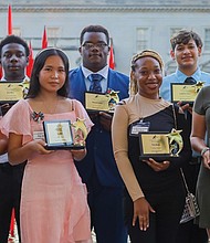 VHEF Momentum Scholars: right to left, Shamari Garnett, Madison Kelly, Tiera Beale, Pray Meh and Janae Thompson. Second row: left to right: Anthony Rodriguez, Zion Wiley, Demario Lonzer, Guillermo Flores, Nonso Akunwafer.