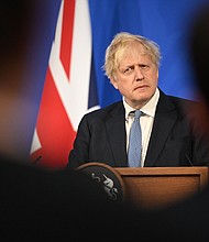 Prime Minister Boris Johnson, seen here at Downing Street on May 25, in London, is to resign on Thursday.
Mandatory Credit: Leon Neal/Getty Images