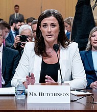 Cassidy Hutchinson, an aide to then White House chief of staff Mark Meadows, testifies last month before a House select committee hearing to Investigate the January 6 attack on the US Capitol, on Capitol Hill in Washington, DC.
Mandatory Credit:	Andrew HarnikAFP/Getty Images