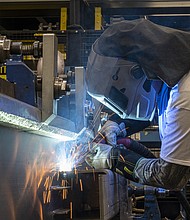 The Producer Price Index, hit 11.3% in June compared to the same period a year ago, according to data released by the Bureau of Labor Statistics, and pictured, an employee in Sacramento, California, on Sept. 28, 2021.
Mandatory Credit:	David Paul Morris/Bloomberg/Getty Images
