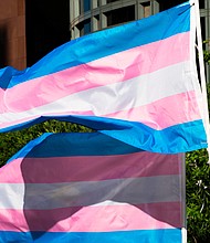 The Biden administration must pause its enforcement of federal guidance seeking to protect transgender students and workers in 20 states, a federal judge ruled and pictured, Trans pride flags on March 31, 2017 in Los Angeles, California.
Mandatory Credit:	ROBYN BECK/AFP/Getty Images