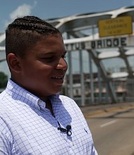 Late Congressman John Lewis' legacy lives on in his friendship with 14-year-old fan Tybre Faw after Faw met Lewis four years ago walking across the Edmund Pettus Bridge for Bloody Sunday, a 1965 march for voting rights in Selma, Alabama.
Mandatory Credit:	CNN