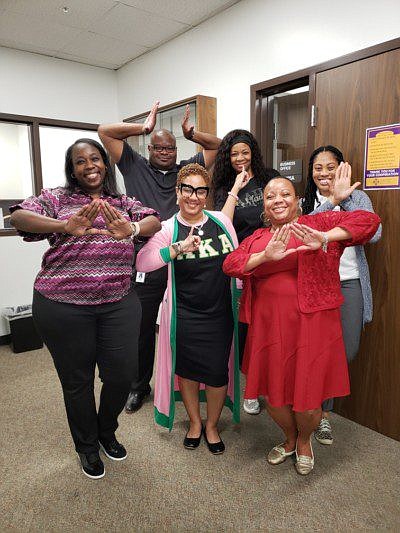 Tondra Moore, PhD, JD, MPH, pictured with colleagues at Prairie View A&M University (PVAMU)
