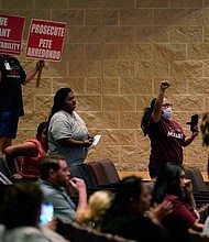 Parents and family attend a special meeting of the Board of Trustees of Uvalde Consolidated Independent School District where parents addressed last months' shootings at Robb Elementary School, Monday, July 18, 2022, in Uvalde, Texas.
Mandatory Credit:	Eric Gay/AP