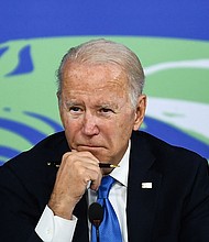 President Joe Biden listens during a meeting on "the Build Back Better World (B3W)", as part of the World Leaders' Summit of the COP26 UN Climate Change Conference in Glasgow, Scotland, on November 2, 2021.
Mandatory Credit:	BRENDAN SMIALOWSKI/AFP via Getty Images