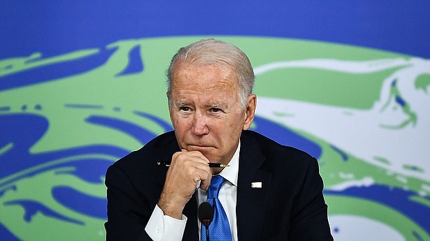 President Joe Biden listens during a meeting on "the Build Back Better World (B3W)", as part of the World Leaders' Summit of the COP26 UN Climate Change Conference in Glasgow, Scotland, on November 2, 2021.
Mandatory Credit:	BRENDAN SMIALOWSKI/AFP via Getty Images
