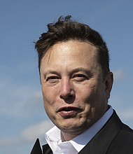 Tesla head Elon Musk talks to the press as he arrives to have a look at the construction site of the new Tesla Gigafactory near Berlin on September 03, 2020 near Gruenheide, Germany.
Mandatory Credit:	Maja Hitij/Getty Images