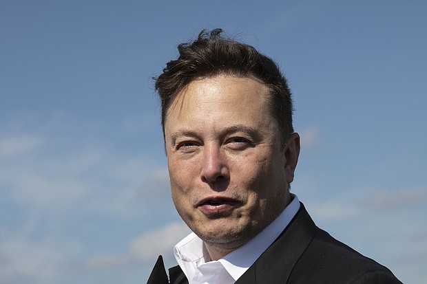 Tesla head Elon Musk talks to the press as he arrives to have a look at the construction site of the new Tesla Gigafactory near Berlin on September 03, 2020 near Gruenheide, Germany.
Mandatory Credit:	Maja Hitij/Getty Images