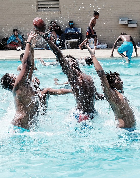 Youngsters beat the heat recently at the Blackwell Community Center swimming pool, 300 E. 15th St. Temperatures are expected to continue in the 90s through this weekend.