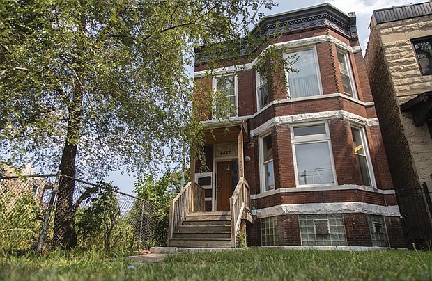 This Aug. 26, 2020, file photo shows the former home of Emmett and Mamie Till at 6427 S. St. Lawrence Ave. in the West Woodlawn neighborhood of Chicago.