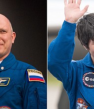 Samantha Cristoforetti (R), an Italian astronaut with the European Space Agency, and Russian cosmonaut Oleg Artemyev are scheduled to conduct a rare joint spacewalk on June 21.
Mandatory Credit:	Joel Kowsky/NASA