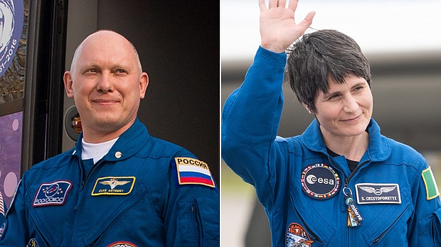 Samantha Cristoforetti (R), an Italian astronaut with the European Space Agency, and Russian cosmonaut Oleg Artemyev are scheduled to conduct a rare joint spacewalk on June 21.
Mandatory Credit:	Joel Kowsky/NASA