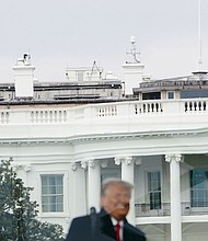 Members of the Secret Service patrol from the roof of the White House on January 6, 2021. The Department of Homeland Security inspector general has directed the Secret Service to stop investigating potentially missing texts related to January 6.
Mandatory Credit:	MANDEL NGAN/AFP via Getty Images