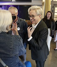 Oregon Democratic gubernatorial candidate Tina Kotek (C) speaks to supporters before the results of Oregon's primary election are announced in May. A historic number of LGBTQ candidates are running for office this year.
Mandatory Credit:	Craig Mitchelldyer/AP