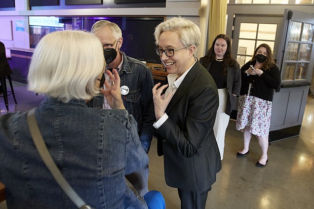 Oregon Democratic gubernatorial candidate Tina Kotek (C) speaks to supporters before the results of Oregon's primary election are announced in May. A historic number of LGBTQ candidates are running for office this year.
Mandatory Credit:	Craig Mitchelldyer/AP