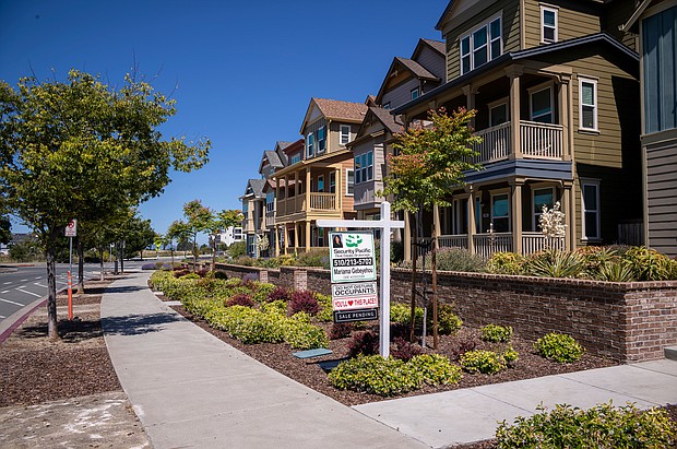 A "For Sale" sign is seen outside a house in Hercules, California, on May 31. Mortgage rates ticked higher for the second week in a row.
Mandatory Credit:	David Paul Morris/Bloomberg/Getty Images