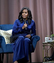 Michelle Obama discusses her book 'Becoming' in Boston in November 2018. Obama announced on July 21 that she has written a new book.
Mandatory Credit:	Paul Marotta/Getty Images