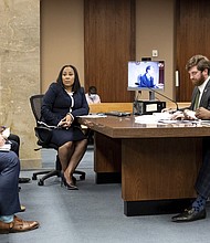 Seen here is Fulton County District Attorney Fani Willis (C). A Georgia judge on July 25 blocked Willis from developing a case against Republican state senator Burt Jones.
Mandatory Credit:	Ben Gray/AP