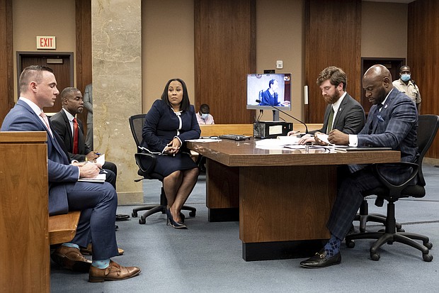 Seen here is Fulton County District Attorney Fani Willis (C). A Georgia judge on July 25 blocked Willis from developing a case against Republican state senator Burt Jones.
Mandatory Credit:	Ben Gray/AP
