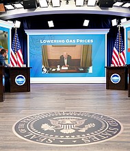 President Joe Biden speaks virtually during a meeting with his economic team in Washington on July 22. Biden's Covid-19 symptoms have "almost completely resolved," his physician said in an update Monday.
Mandatory Credit:	Andrew Harnik/AP