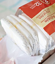 A package of Kimberly-Clark Corp. Huggies brand diapers is arranged for a photograph in Princeton, Illinois, U.S., on Tuesday, Oct. 16, 2018.    Diapers are a notoriously large expense for caregivers of newborns, toddlers and adults suffering from incontinence.
Mandatory Credit:	Daniel Acker/Bloomberg/Getty Images