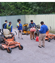 SmartScaping Founder & CEO Bryan Smart meets with a group of students currently interning with the company.